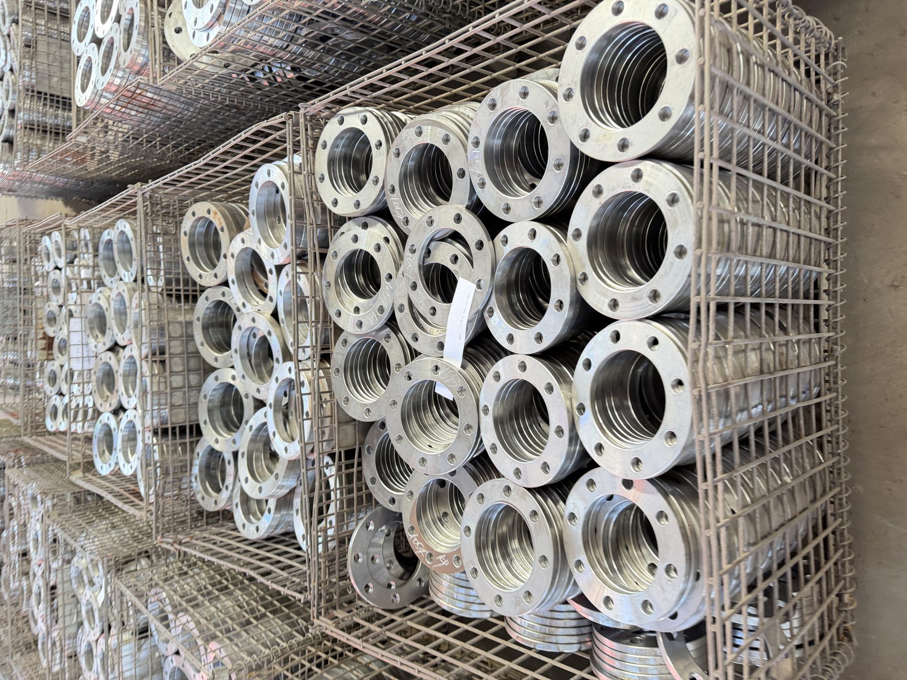 Stainless steel flanges in production crates