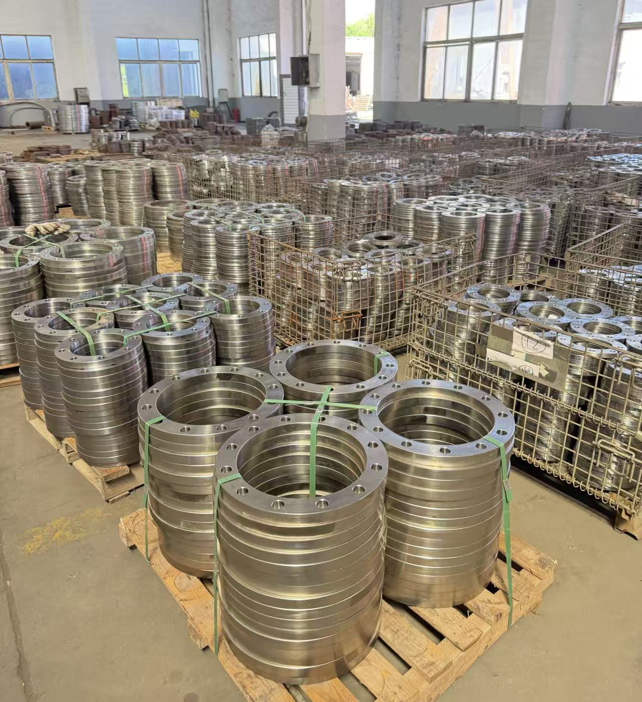 Stacked flanges awaiting coating